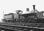 Ex-LNWR 2F 0-6-0 No 8488, known to railwaymen as a Cauliflower, is seen shunting in the shed with the branch lines to Coventry in the foreground