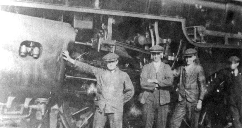 Another view of Charlie Woodford and his fitters this time posed in front of the valve gear of LMS 5F/4F 2-6-0 No 13113