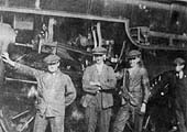 Another view of Charlie Woodford and his fitters this time posed in front of the valve gear of LMS 5F/4F 2-6-0 No 13113