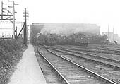 View of Nuneaton's rebuilt shed with a full compliment of locomotives being prepared for work on 7th October 1962