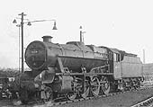 Ex-LMS 8F 2-8-0 No 48258, with Fowler 3500 gallon tender, is seen getting preparing to leave the shed