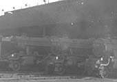 An unidentified ex-LMS 8F 2-8-0 locomotive and two ex-LMS 5MT 4-6-0 locomotives are seen at the front of Nuneaton shed