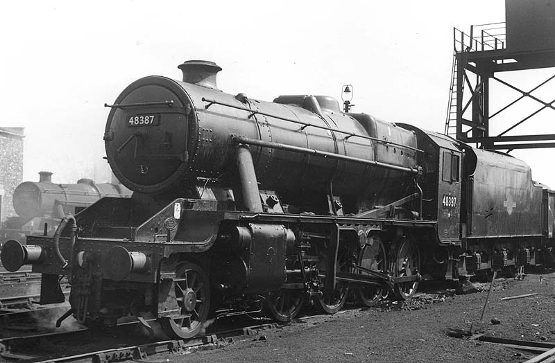 Ex-LMS 2-8-0 8F No 48387 is seen standing alongside Nuneaton's Ash Plant being prepared for its next turn of duty