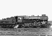 Ex-LMS 2-6-0 4MT No 43024 is seen standing on shed with steam escaping from one of its injectors prior to leaving the shed