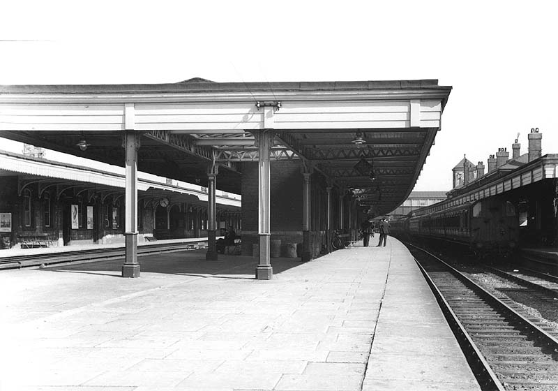 View looking towards Rugby along platform two  of Nuneaton's third station with the main station building situated on platform one