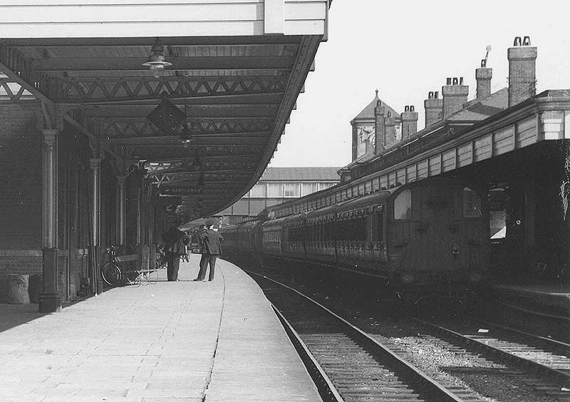 Close up showing a push-pull train standing in platform one on the right ready to depart for Leamington