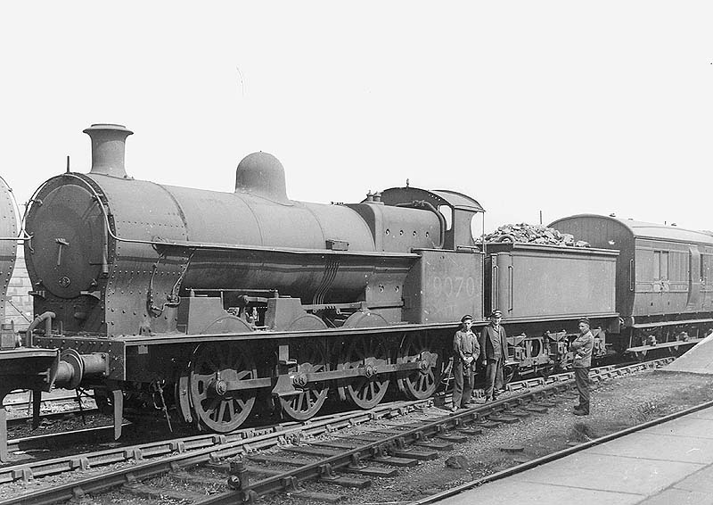 LNWR 0-8-0 class G2a No 9070 is seen standing alongside the up Ashby bay coupled to a full brake and another member of the same class