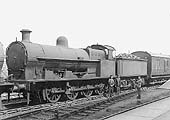 LNWR 0-8-0 class G2a No 9070 is seen standing alongside the up Ashby bay coupled to a full brake and another member of the same class