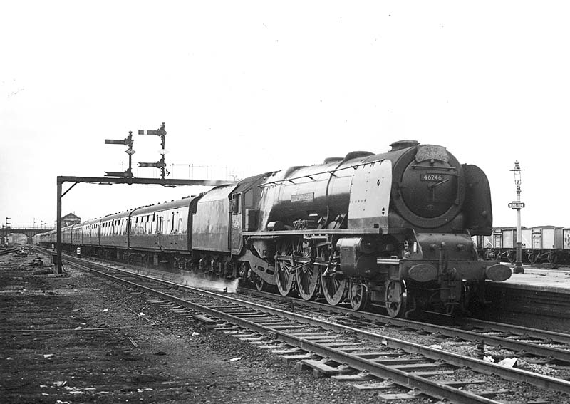 Ex-LMS 4-6-2 Coronation class No 46246 'City of Manchester' is seen entering Nuneaton station at the head of the up Royal Scot