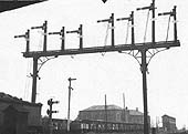 Looking to Rugby from under Leicester Road bridge showing the signals that controlled access to Nuneaton station