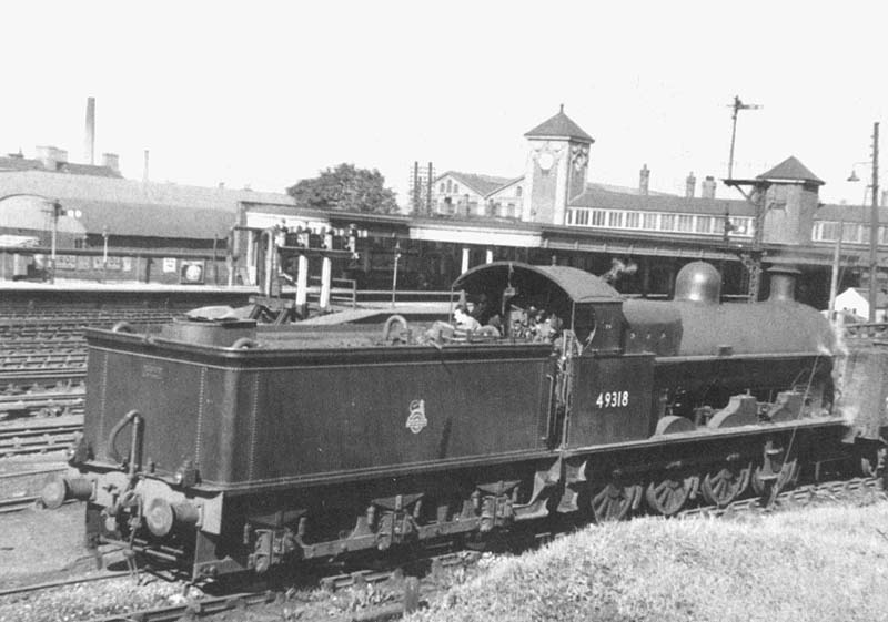 Ex-LNWR 0-8-0 class G2a No 49318 is seen shunting stock over the hump in Nuneaton's up marshalling yard