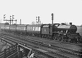 Ex-LMS 4-6-0 5XP Jubilee class No 45552 'Silver Jubilee' is seen on an up Liverpool to Rugby express passing Ashby Junction on May 1956