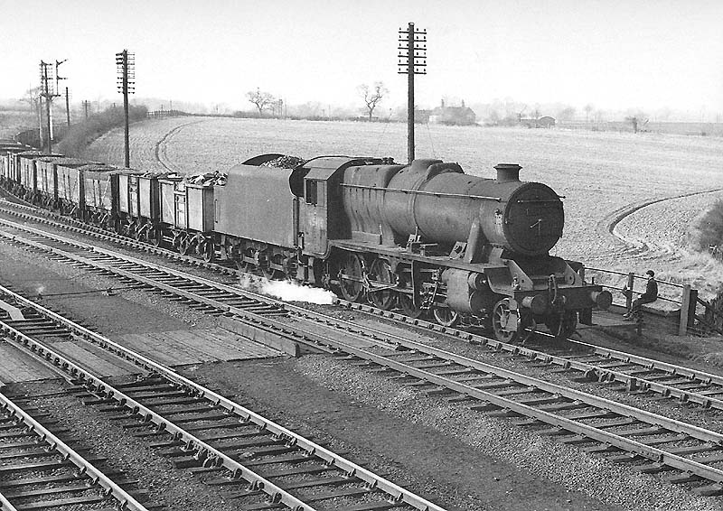 Ex-LMS 2-8-0 8F No 48416 is seen coming off the Ashby branch with a heavy coal train bound for Nuneaton Marshalling yards