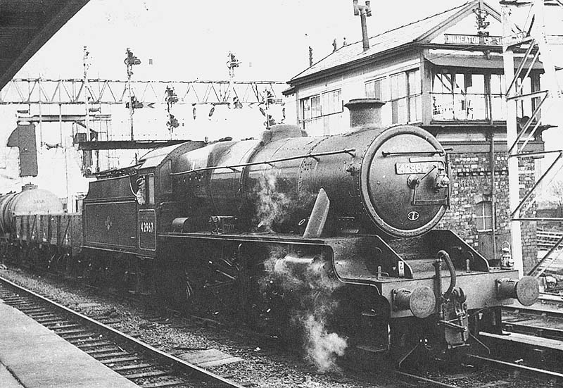Ex-LMS 2-6-0 'Stanier Crab' No 42967 waits by Nuneaton Up Siding Signal Cabin on a southbound freight on 22nd April 1963