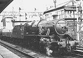Ex-LMS 2-6-0 'Stanier Crab' No 42967 waits by Nuneaton Up Siding Signal Cabinon a southbound freight on 22nd April 1963