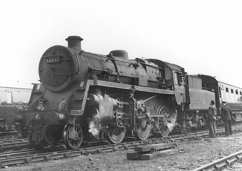 Britiah Railways Standard class 4MT No 76033 is seen marshalling stock in the carriage sidings ready to move to Nuneaton station