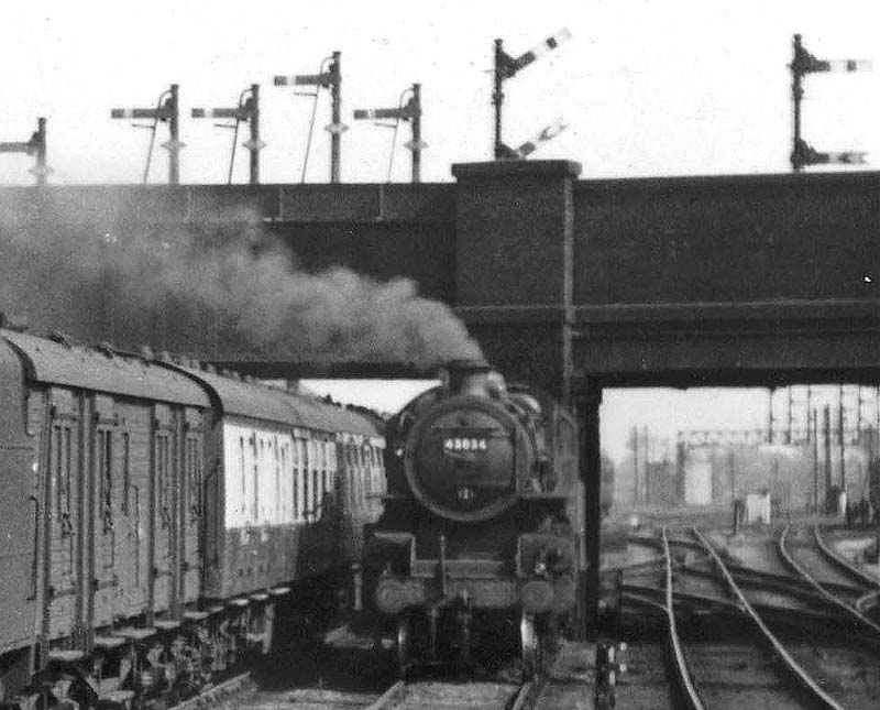 Close up showing ex-LMS 4MT 2-6-0 No 43024 standing in the pilot road that lay immediately to the front of Leicester Road bridge abutment