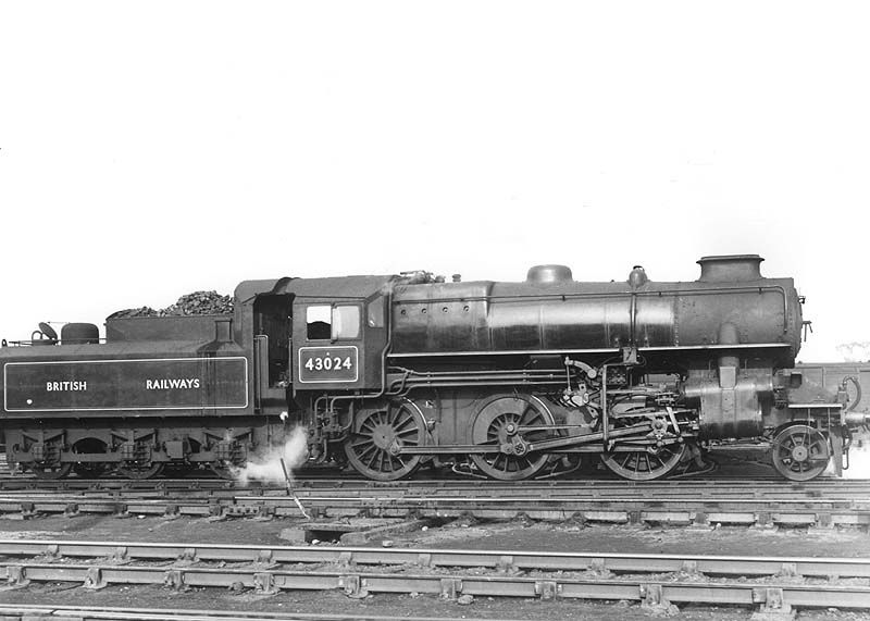 British Railways built 2-6-0 4MT No 43024 is seen standing between duties in Nuneaton's up marshalling yard