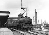 Ex-LMS 7P 4-6-0 Rebuilt Royal Scot class No 46146 'The Rifle Brigade' is seen at the head of an up express service to Euston