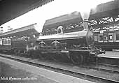 LNWR 2-2-2-2 Greater Britain Class No 525 'Princess May' stands with a down express service at Nuneaton circa 1900