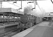 BR English Electric Type 4 Diesel D219 is seen being uncoupled from its train at Nuneaton on 26th March 1964