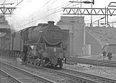 BR built 4-6-0 No 44680 passes beneath Leicester Road with a down Type 3 express freight working