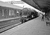 Ex-LMS 8P Coronation Class 4-6-2 No 46248 'City of Leeds' passes by platform 4 on an up Type 3 working on 6th August 1964