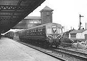 A two-car Metro-Cammell Diesel Multiple Unit forms the 4:40pm Tamworth to Rugby service on 11th March 1961