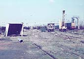 A view of Nuneaton down sidings goods yard with the Trent Valley line on the right circa 1980