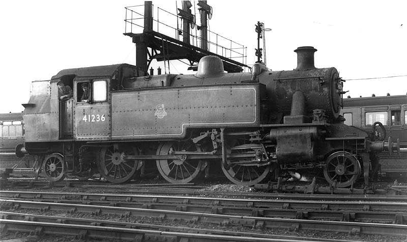 British Railways built 2MT 2-6-2T No 41236 is seen standing in the short siding situated between the down fast and down slow at the northern end of the station