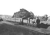 Ex-Midland Railway 3F 0-6-0 No 3581 is seen on a four-coach local passenger working to Leamington during the late 1930s
