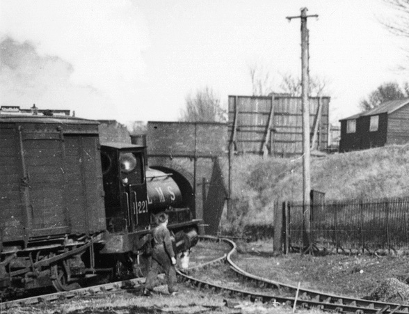 Close up showing the former L & Y 0-4-0ST Class 1153 No 11221 locomotive marshalling vans in Mitchell & Butler's sidings in 1949