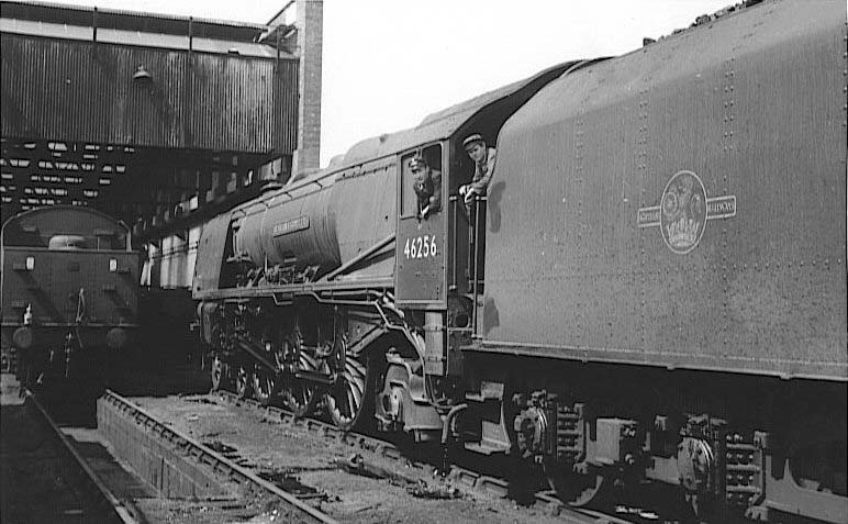 Ex-LMS 8P 4-6-2 Princess Coronation Class No 46256 'Sir William Stanier FRS' stands outside Rugby No 1 shed