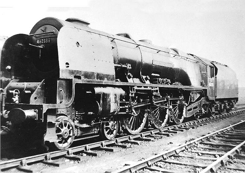 Ex-LMS 8P Princess Coronation Class No 46233 'Duchess of Sutherland' is seen standing on shed having been fully serviced