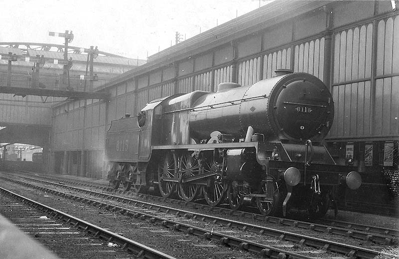 In ex-works condition LMS 4-6-0 Royal Scot class No 6115 'Scots Guardsman' stands outside the trainshed ready to take forward a down express