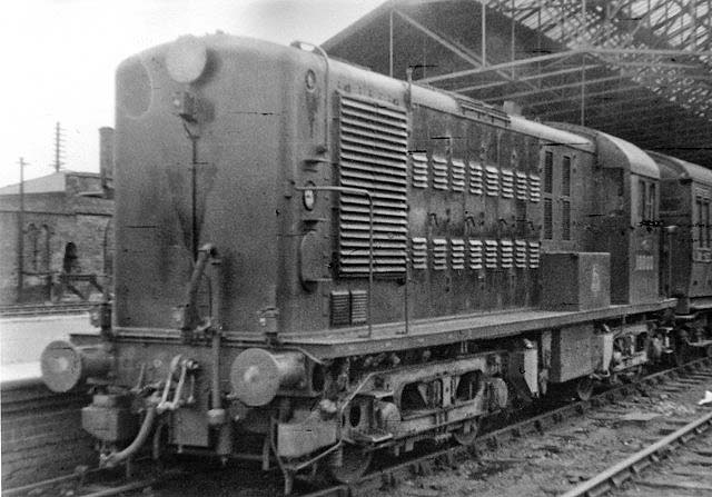 Experimental Bo-Bo diesel locomotive No 10800 stands in the Midland bay at the head of a Rugby to Peterborough local passenger train