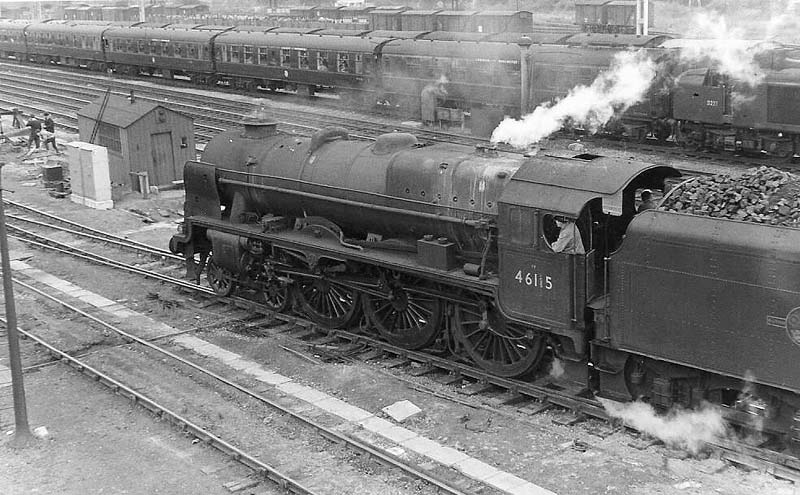 Ex-LMS 6P 4-6-0 Royal Scot Class No 46115 'Scots Guardsman' is seen shunting Rugby's goods yard in 1963