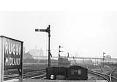 Close up showing the lineside structures at the Birmingham end of the up platform and the footbridge in the distance