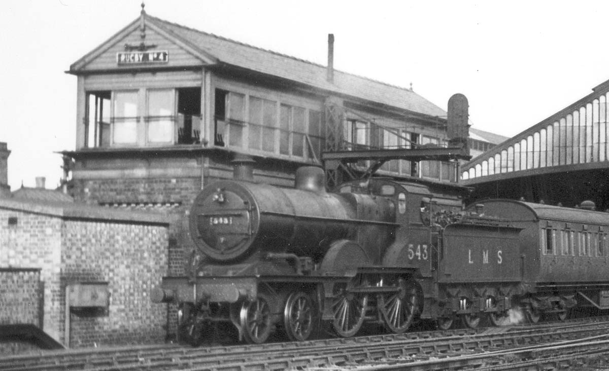 Close up of ex-MR 4-4-0 2P No 543 showing the original Deeley tender the class were fitted with prior to Henry Fowler version