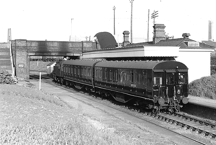 Looking towards Weeden from the Leamington end of the down line with a two-coach push-pull train standing at the down platform