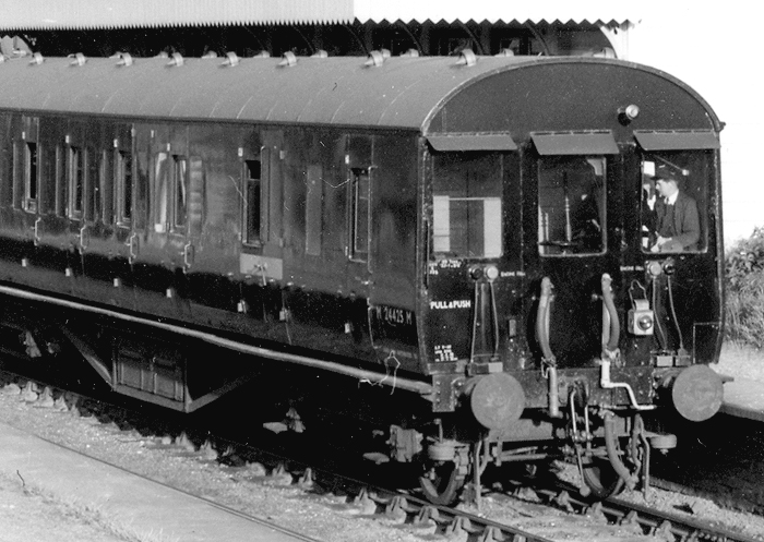 Close up of the cab in the driver trailer showing the vacuum operated controls inside the middle window of the cab and the pipework fitted outside