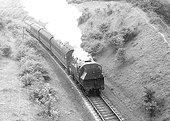British Railways built Ivatt 2MT 2-6-2T No 41231 is seen running bunker first at the head of Warwick (Milverton) to Weeden local passenger service