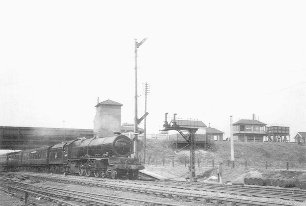 Ex-LMS 7P 4-6-2 No 46203 'Princess Margaret Rose' passes through on the fast up line at the head of a Liverpool to Euston service
