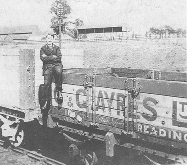 Harry Addison poses on a five-plank open coal wagon stabled on one Three Spires Junction's exchange sidings