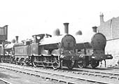 Close up showing ex-LNWR 2F 0-6-0 'Cauliflower' No 8455 standing alongside an unidentified ex-LNWR 7F 0-8-0 'Super D' in the late 1920s