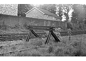 Milverton's last remaining siding, which ran parallel to the main line, and its buffer stop as seen in May 1972