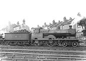 Ex-LNWR 4-4-0 No 25286 'Dunrobin' is seen with crew and in steam outside Warwick shed in the early 1930s
