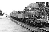 British Railways built Ivatt 2MT No 46446 is seen at the head of a Nuneaton to Leamington local passenger service in June 1951