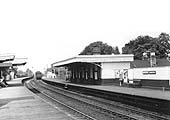 Looking towards Kenilworth as a Nuneaton to Leamington motor train passes the site of the original 1844 station in July 1951