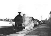 Ex-LNWR 0-8-0 G2 No 9409 passes through Warwick Milverton station with a northbound goods service in 1937